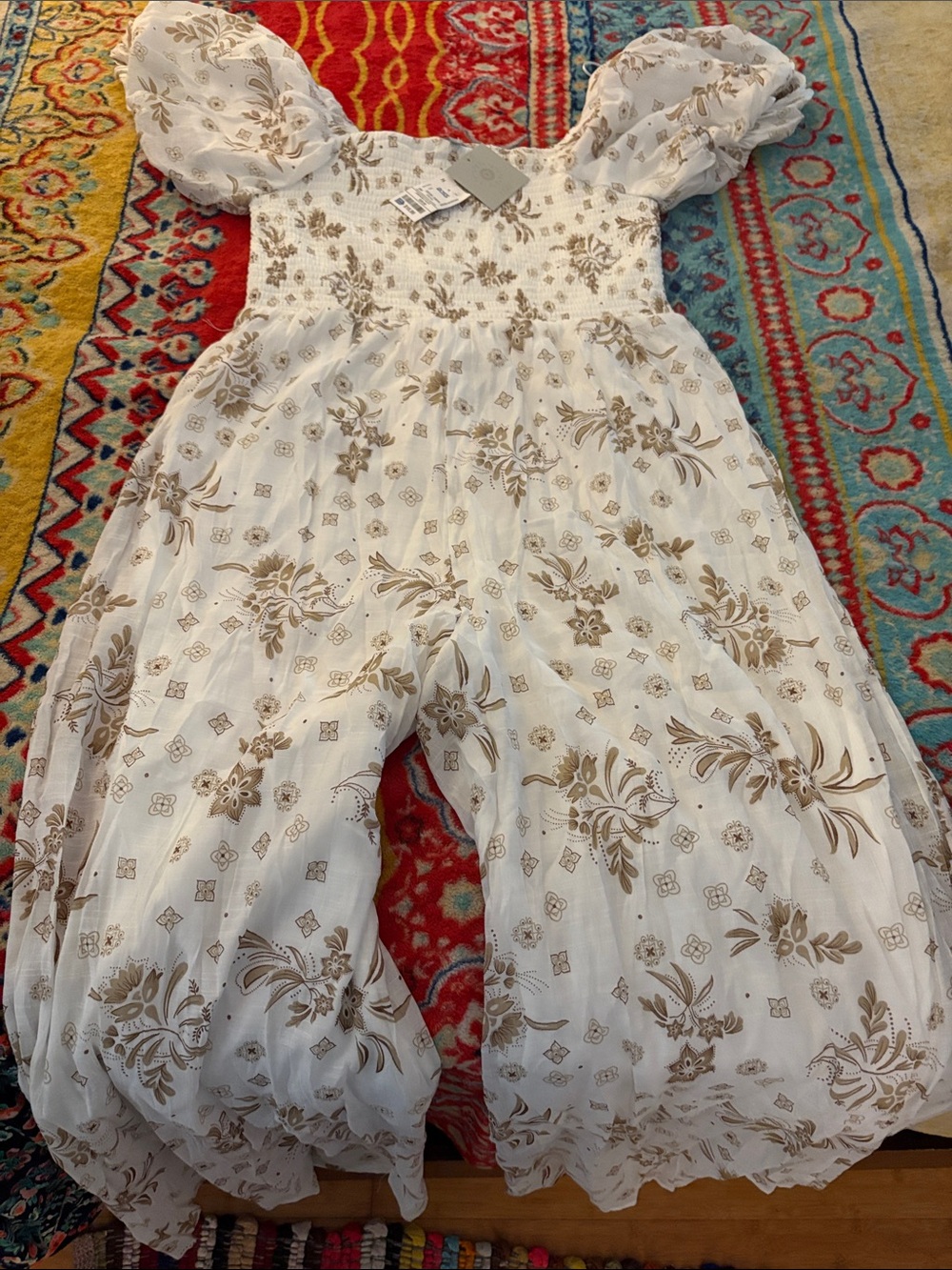 Smocked White Jumpsuit with Tan Floral Print